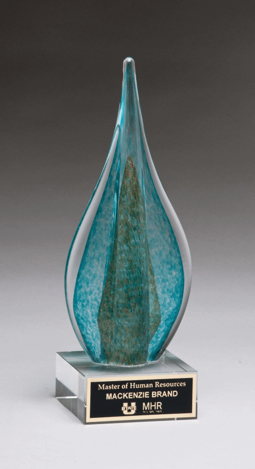 Flame-shaped art glass award with teal and green colors and gold metallic accent. 2300