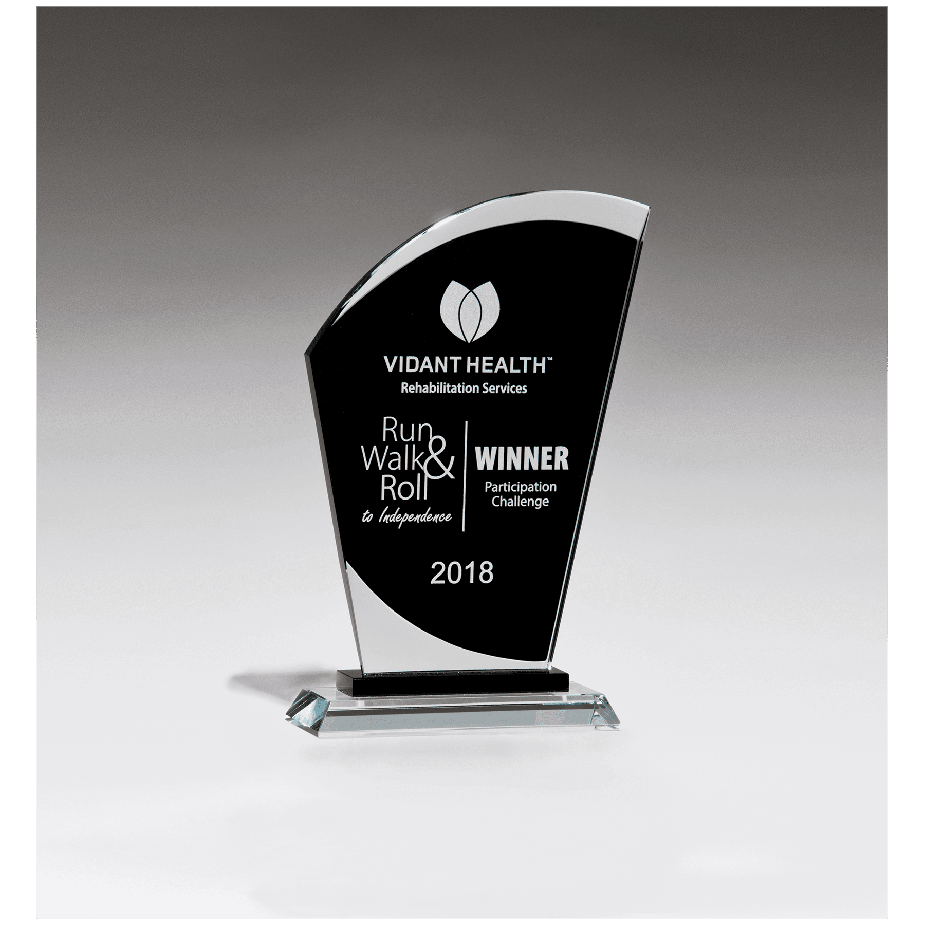 G2924 - 5 1/8" x 8" Sail Shaped Glass Award with Black Center